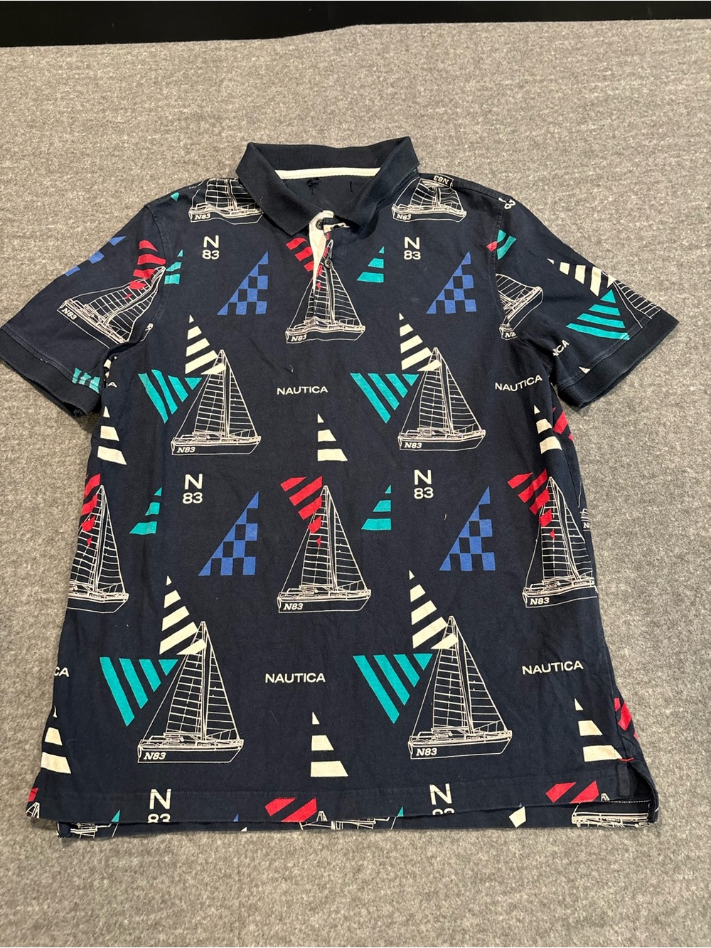 Nautica navy blue polo shirt with sailboat design size Medium